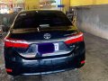 Selling Black Toyota Corolla Altis 2014 in Gapan-4