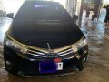 Selling Black Toyota Corolla Altis 2014 in Gapan-5