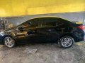 Selling Black Toyota Corolla Altis 2014 in Gapan-2