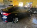 Selling Black Toyota Corolla Altis 2014 in Gapan-2