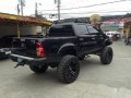Selling Black Toyota Hilux 2012 in Mandaue-3