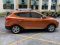 Orange Hyundai Tucson 2013 for sale in Cainta-0