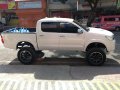 Selling White Toyota Hilux 2.5 G 2012 in Talisay-7