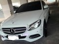 Selling Pearlwhite Mercedes-Benz C200 2015 in Quezon-1