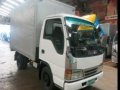 SELLING ISUZU ELF N SERIES ALUMINUM CLOSED VAN TRUCK 4 WHEEL-0