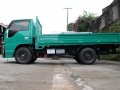 SELLING ISUZU NKR DROPSIDE 4 WHEEL TRUCK-1