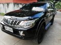 2016 MITSUBISHI STRADA MT with mags and canopy-0