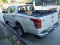 White Mitsubishi Strada 2015 2.5 Diesel GLx Manual for sale in Quezon City-1