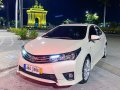 Pearlwhite Toyota Corolla Altis 2014 for sale in Pasig-6