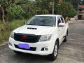 White Toyota Hilux 2013 for sale in Quezon-1