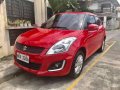 Red 2016 Suzuki Swift Hatchback-3