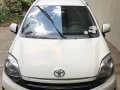 Pearl White Toyota Wigo 2015 for sale in San Mateo-4