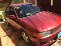 Need to sell Red 1997 Mitsubishi Lancer Sedan second hand-0