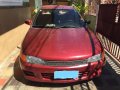 Need to sell Red 1997 Mitsubishi Lancer Sedan second hand-1