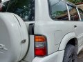 White Nissan Patrol 2003-2