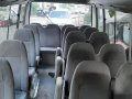 White Toyota Coaster 2008-5