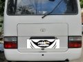 White Toyota Coaster 2008-4