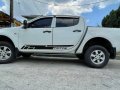  White Mitsubishi Strada 2013 -5