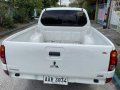  White Mitsubishi Strada 2013 -4