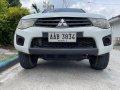  White Mitsubishi Strada 2013 -3