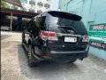 Selling Black Toyota Fortuner 2013 in Makati-5
