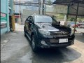 Selling Black Toyota Fortuner 2013 in Makati-6