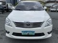 Pearl White Toyota Innova 2013 -2