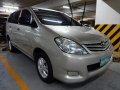 Silver Toyota Innova 2009 -2