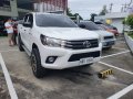 Selling White 2016 Toyota Hilux Pickup affordable price-1