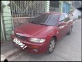 Red Mazda 323 2016 for sale in Rodriguez-0