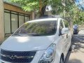 Selling White 2015 Hyundai Grand Starex TCI 2.5 GL MT (18-seater) Second Hand-0