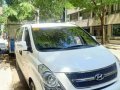 Selling White 2015 Hyundai Grand Starex TCI 2.5 GL MT (18-seater) Second Hand-1