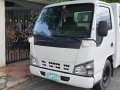 White Isuzu NHR 2009 for sale in Quezon-1