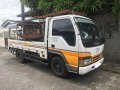 Selling White and Yellow Isuzu Elf 2015 in Imus-2