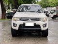 Selling White Mitsubishi Strada 2012 in Makati-8
