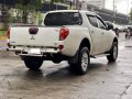 Selling White Mitsubishi Strada 2012 in Makati-6