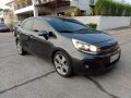 Second hand 2014 Kia Rio 1.4 EX AT for sale in good condition-0