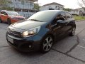 Second hand 2014 Kia Rio 1.4 EX AT for sale in good condition-2