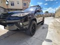 Selling Black Toyota Fortuner 2016 in Magalang-0