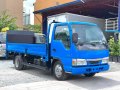 2015 MODEL ISUZU ELF DROPSIDE 14.5FT NKR WITH POWER LIFTER 4HL1-1