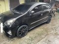 Black Toyota Wigo 2014 for sale in Quezon-5