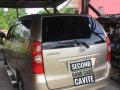 Golden Toyota Avanza 2010 for sale in Imus-5