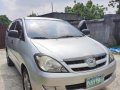 Selling Brightsilver Toyota Innova 2006 in Cavite-8