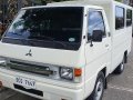 White Mitsubishi L300 2016 for sale in Quezon-8