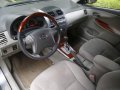 Brightsilver Toyota Corolla Altis 2010 for sale in Quezon-1