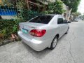 Brightsilver Toyota Corolla Altis 2005 for sale in Taguig-4