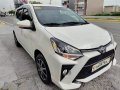 Pearl White Toyota Wigo 2021 for sale in Manila-8