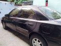 Black Mazda 323 1997 for sale in Parañaque-1