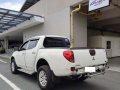 Selling White Mitsubishi Strada 2012 in Makati-4