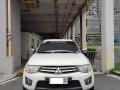 Selling White Mitsubishi Strada 2012 in Makati-8